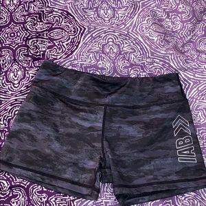 Brand new IAB black camo gym shorts.